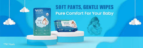 A blue-themed banner for Lyfcare baby products. It shows a package of "Luxurious Baby Pants" and a pack of "Baby Wet Wipes" on white pedestals, with a soft illustration of a mother holding a baby in the background