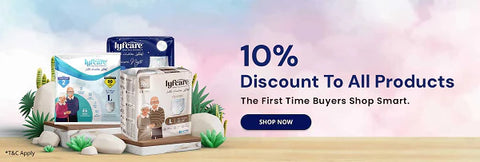 Promotional banner offering a 10% discount on all products for first-time buyers. The image displays various Lyfcare adult diaper packages against a pastel background with greenery and rocks.
