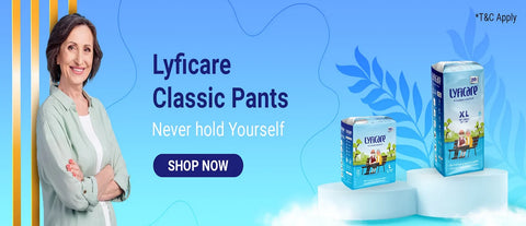 Promotional banner for Lyficare Classic Pants, featuring a smiling woman on the left and two blue pairs of pants displayed on white pedestals on the right, with text reading 'Lyficare Classic Pants' and 'Never hold Yourself' on a bright blue background.