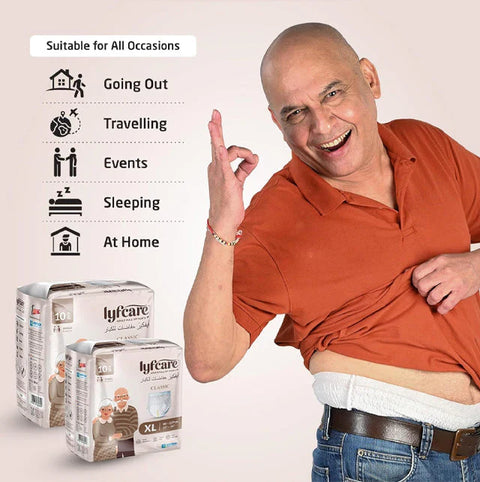 Smiling, happy elderly man wearing Lyfcare Adult Pull-Up Pants (Size XL packaging visible). Text lists suitability for all occasions: Going Out, Travelling, Events, Sleeping, and At Home